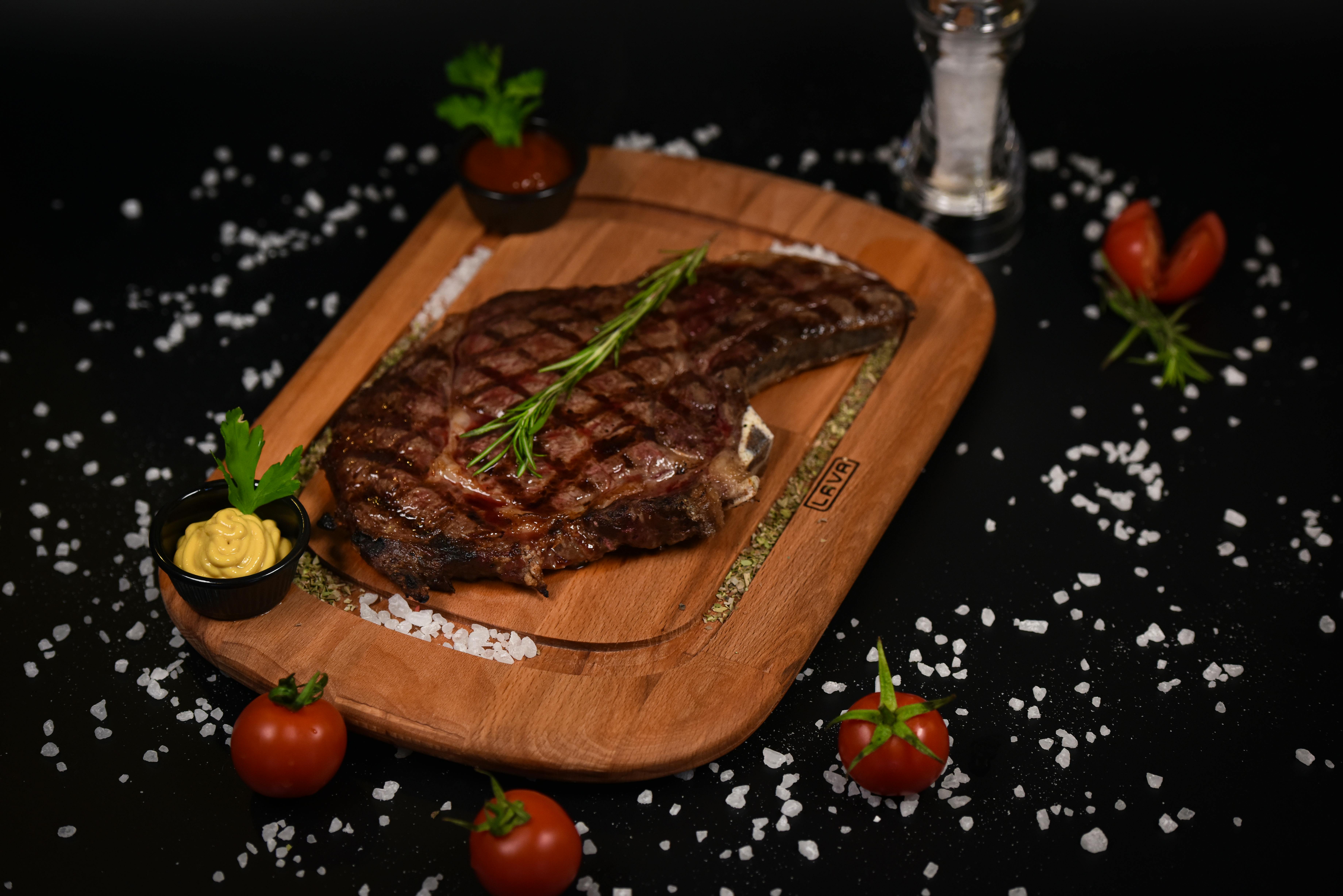 Grilled beef steak served on plate