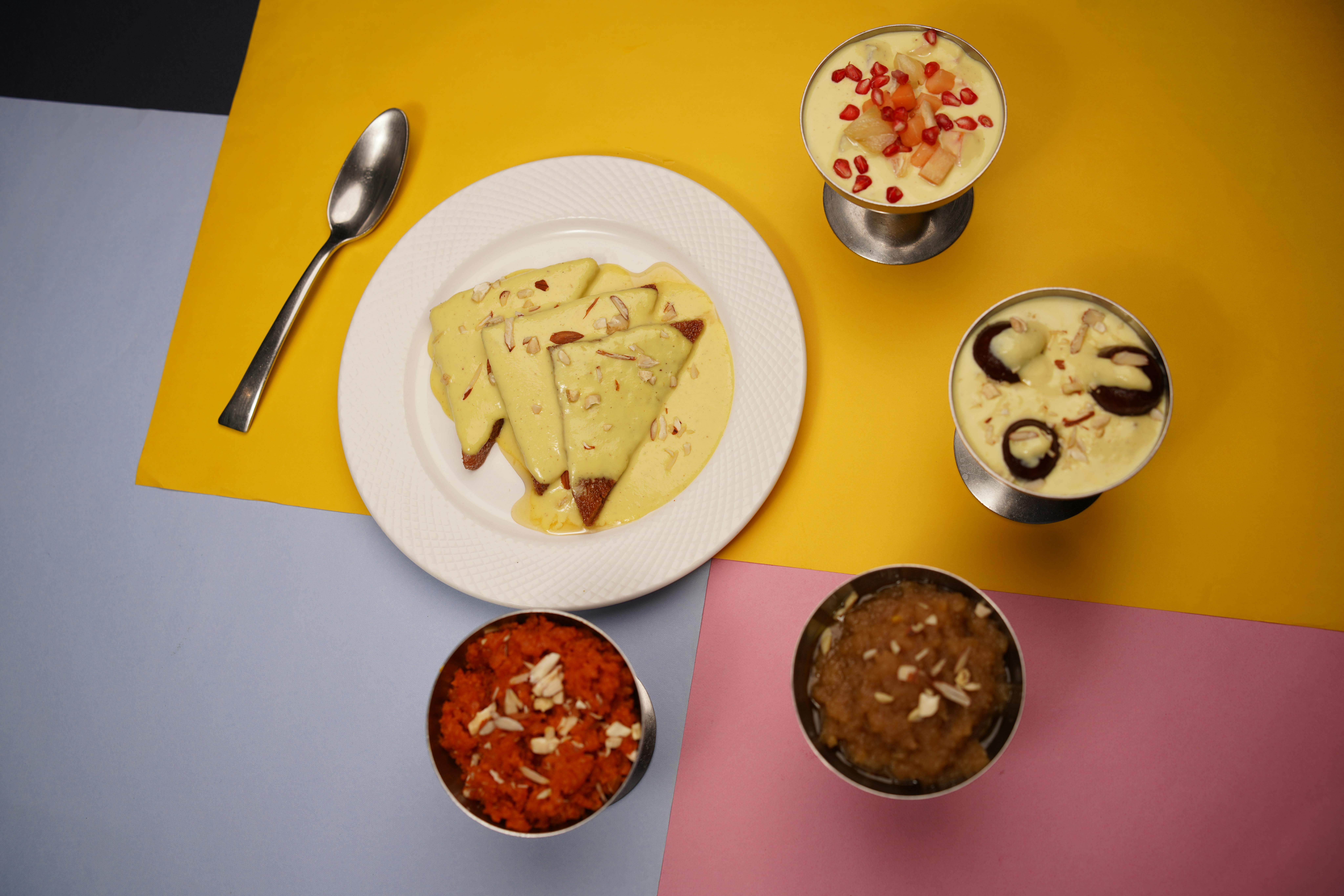 Dessert in glass with blackberries and mint, square crop