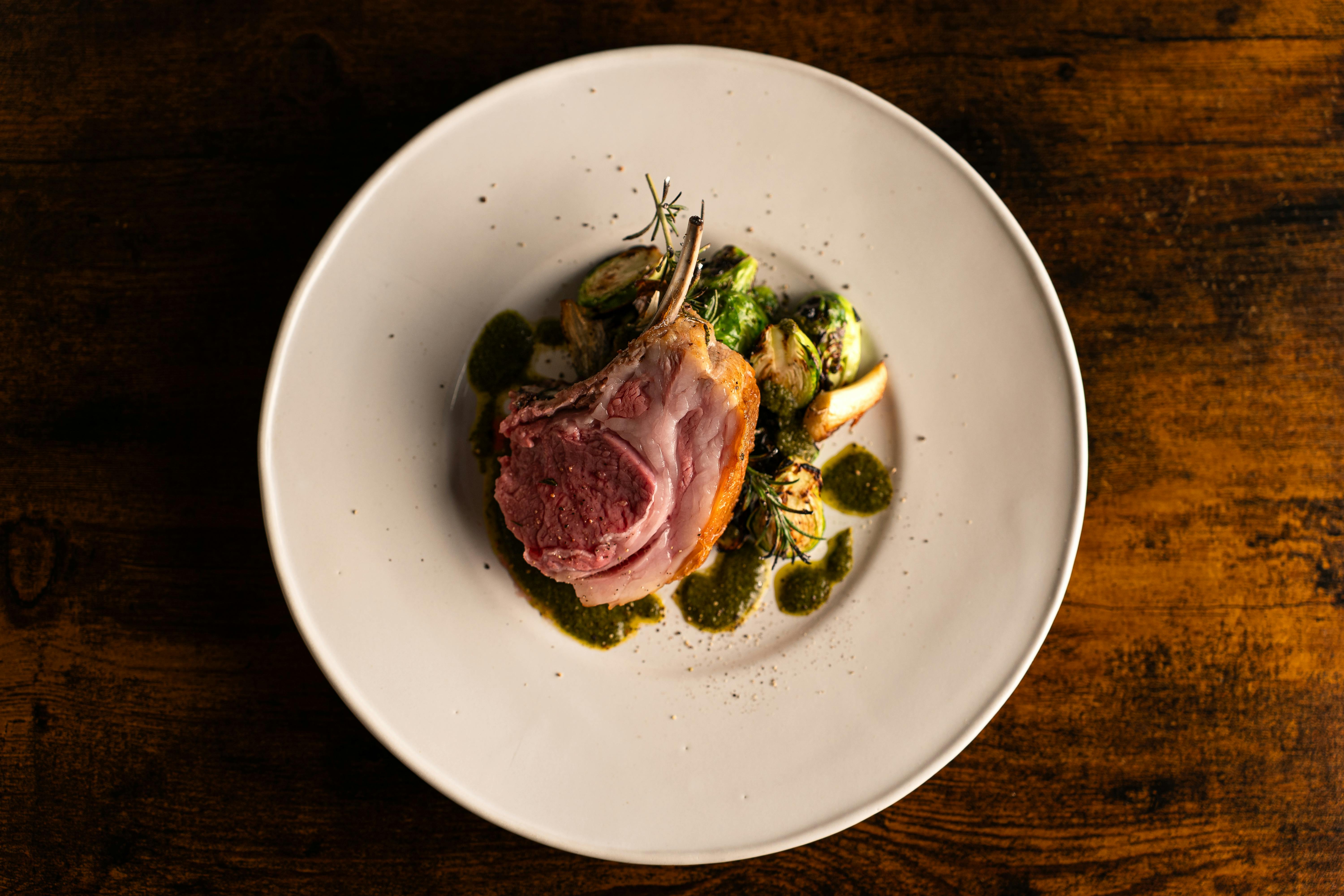 Grilled beef steak served on plate